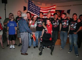 Veterans gathering at a community event, highlighting camaraderie and engagement.