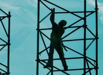 a man on a scaffold