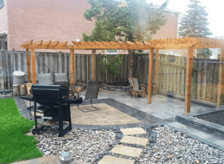 a patio with a grill and grilling area