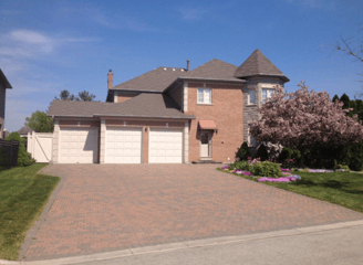 a house with a driveway and driveway with a driveway