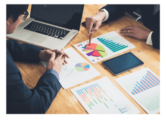 Export consultancy meeting with strategic planning documents on the table – Zyncopra foreign trade s