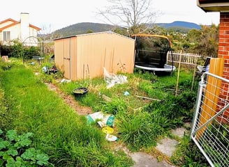 Junk-filled backyard, illustrating the type of property Easy Sell SA helps homeowners sell without n