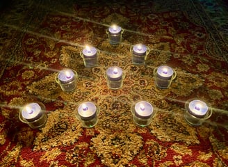 Ten lit candles.