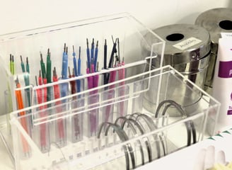 a desk with a lot of teeth aligners tools