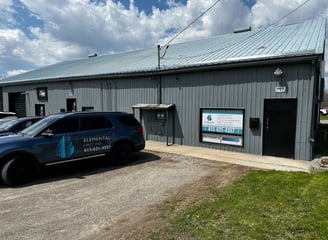 a vehicle beside a building