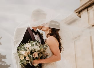 A just married couple kissing