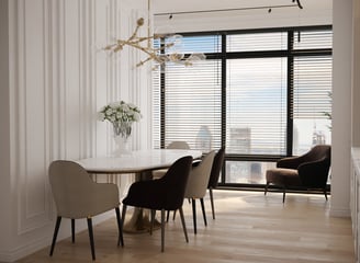 a dining room with a table and chairs