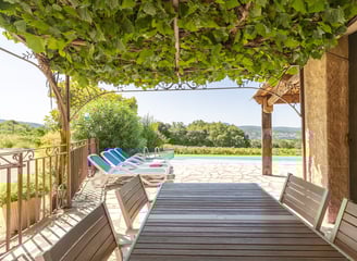 a patio table with chairs and a table