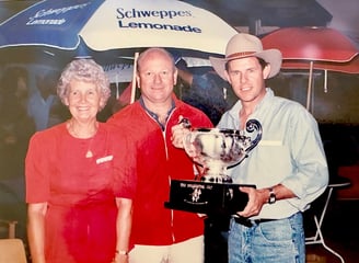 Joan Pickering, Laurie Connell & Peter Pickering with The Burlington Cup polo trophy