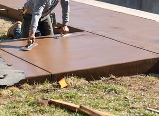 a man is using a sanded in concrete