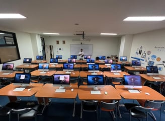 a classroom with a classroom desk and a classroom desk