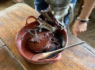 a person is using a grinder in a bowl