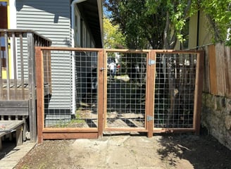 a fenced in area with a fenced in area with a fenced in