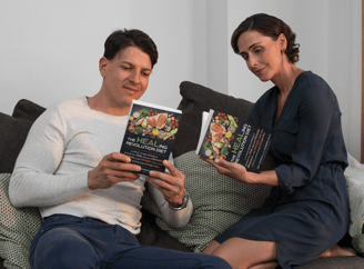 couple reading Healing Revolution Diet