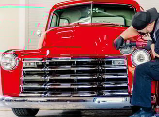 owner of  D and P Auto Detailing working on a car