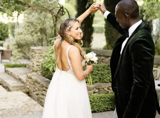 Groom discovering his bride during a romantic first look in Provence