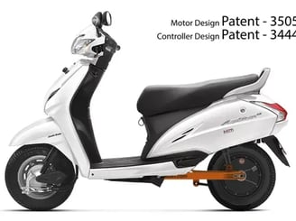 a white scooter with a black seat and a white scooter