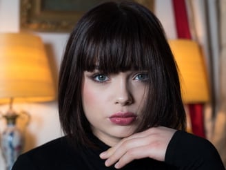 a woman with a black shirt and a black shirt