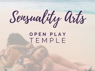 a woman laying on a beach with a woman and woman