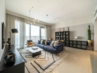 a living room with a couch and a television