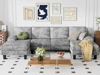 a couch with pillows and pillows on it