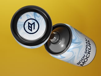 Close-up body spray mockup showing cap interior and spray nozzle against a golden backdrop