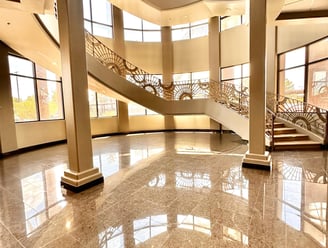 a large room with a staircase and a staircase