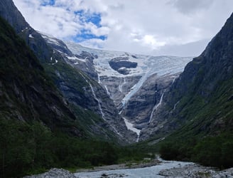 Kjenndal Glacier with lake and mountain in Norway
