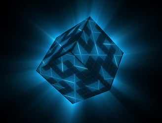 a blue and black cube shaped object with a glowing blue light