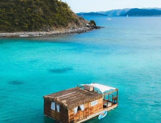 A floating spa in the blue waters off the coast of White Bay, BVI