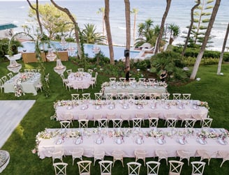 Destination wedding setup in the seaside gardens of Villa El Rincon in Marbella