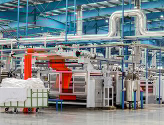Textile Factory with pipes, bands and industrial motors