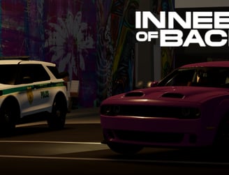 a man standing in front of a wall with a car in the background