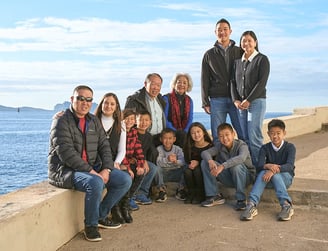 Family portrait along the Vieux Port with seaside background