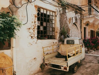 a truck parked in front of a building