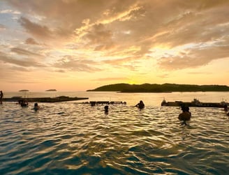 hotel swimming pool with sunset view