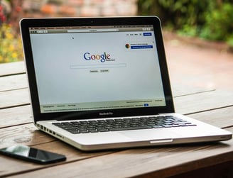 Google Homepage on Laptop Screen