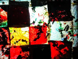 Red abstract patchwork motif from recycle plastic ironed 