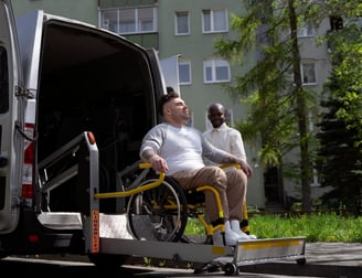 a man in a wheelchair with a wheelchair in a wheelchair