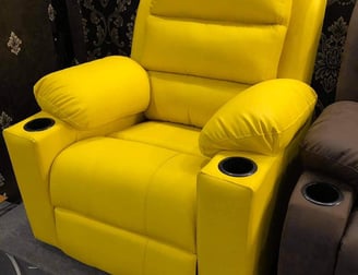 A yellow recliner by afsar sofa repair