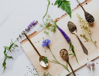 Natural herbs spread on a wood cuttingboard