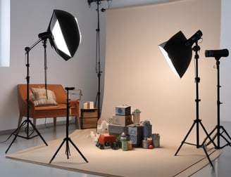 three green linear leafed plants beside softbox