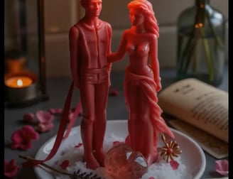 a couple of candles that are sitting on a plate