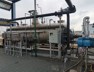A JexDry paddle dryer in an industrial setting, highlighting its energy-efficient design