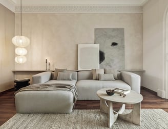 Sophisticated Living room with modern decor, custom lighting, a neutral color palette and art