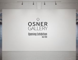 sner Gallery Opening Exhibition poster showing a minimalist gallery wall with spotlighting, marking the launch of the gallery
