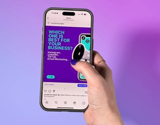 Hand browsing Purple Track’s social media post about choosing the best platform for your business