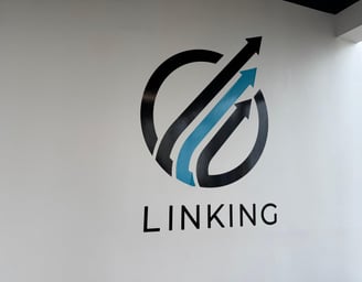 a logo on a wall of a building
