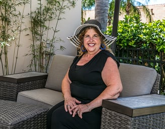 A photo of Nandy Town, the founder of Manor Magic in Celebration, Florida, who specializes in design and soft staging