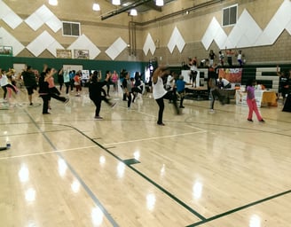 Enhancing Forward Action Inc. image of a group yoga